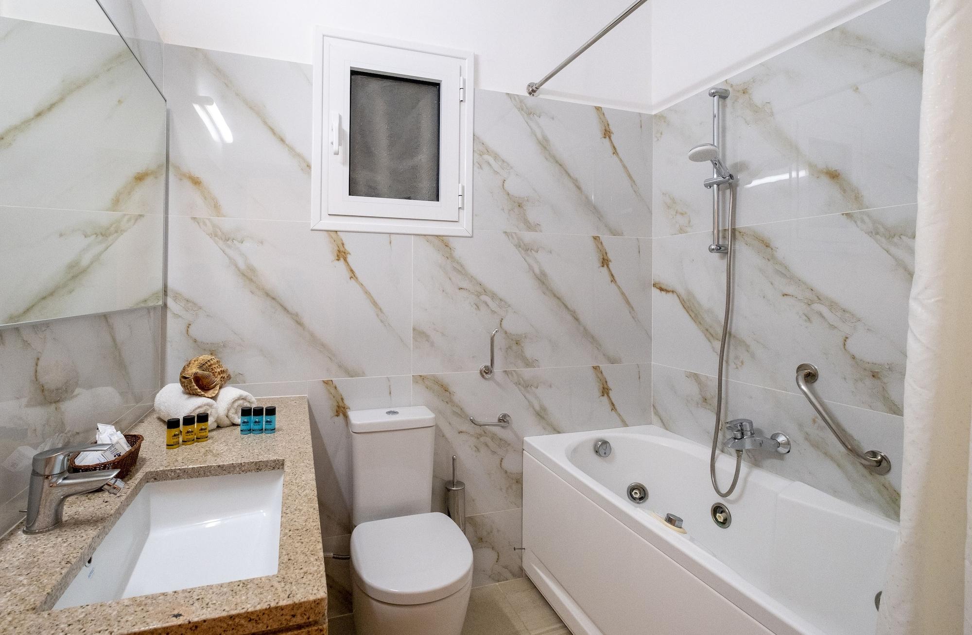 Dolfin Hotel Toló Kültér fotó